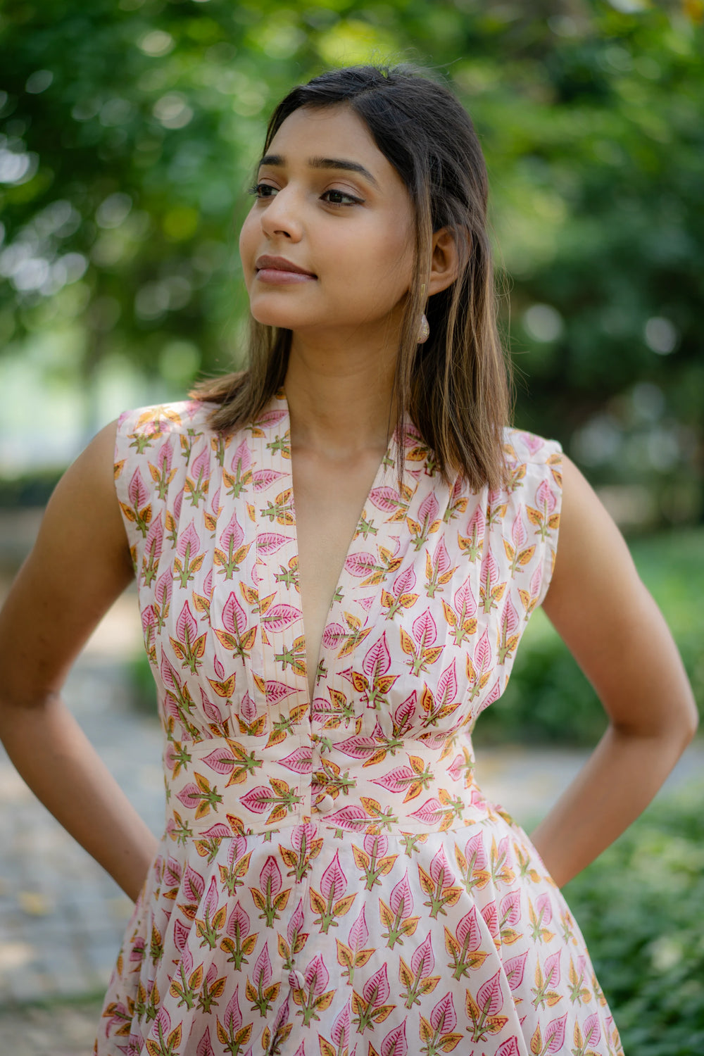 Nuchic Twirl Belle – floral hand-block print midi dress, 3/4 angle view